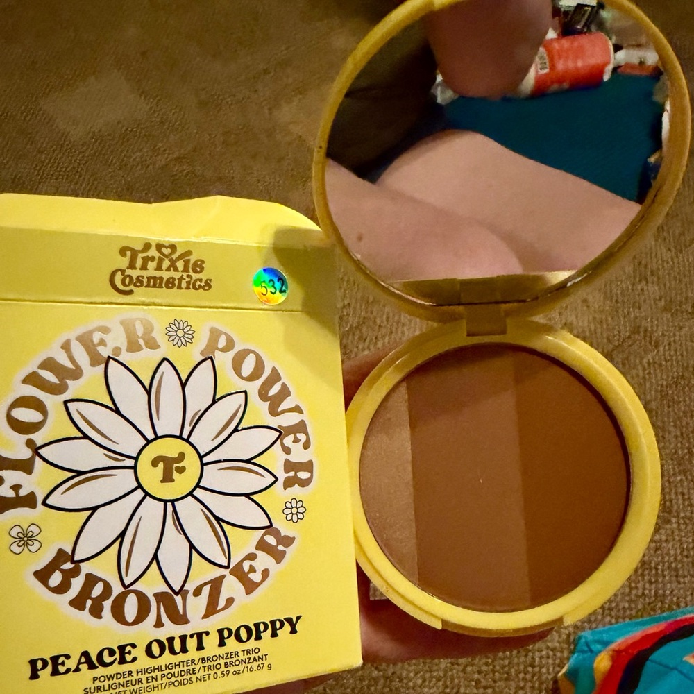 Trixie Cosmetics Flower Power Bronzer in shade "Peace Out Poppy". New